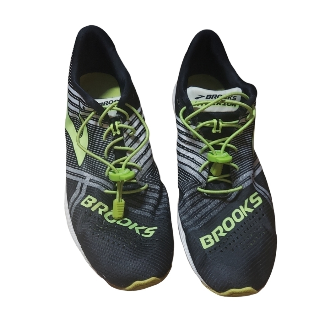 11 brooks black and green sneakers